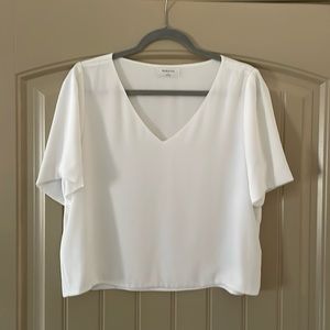 Loose white cropped V neck blouse with flutter sleeve - size L
